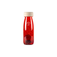 Petit boum, butelka sensoryczna, float, czerwona